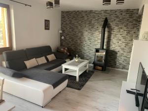 A seating area at Apartmán Lesníček