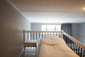 Llit o llits en una habitació de Ekebyhov Hotell