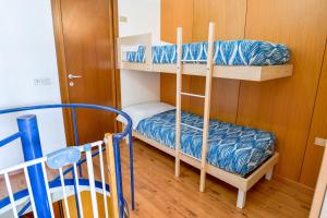 Voodi või voodid majutusasutuse Res. Marilleva 1400 Apt.Solandra toas