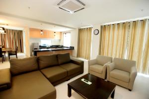 Χώρος καθιστικού στο Merdeka Suites Hotel