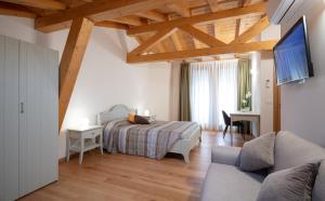 Rúm í herbergi á Agriturismo I Comelli
