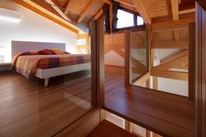 Rúm í herbergi á Agriturismo I Comelli