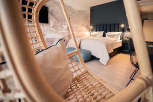 Postel nebo postele na pokoji v ubytování Hotel & Spa Suiten FreiWerk