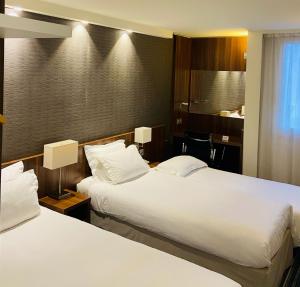 Postel nebo postele na pokoji v ubytování Holiday Inn Express Lille Centre by IHG