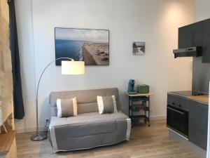 Una cama o camas en una habitación de Le Clos Beaufleury