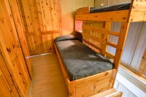 Voodi või voodid majutusasutuse Res. Marilleva 1400 Apt.Solandra toas