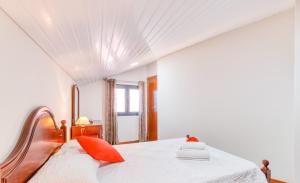 Llit o llits en una habitació de North Coast View House