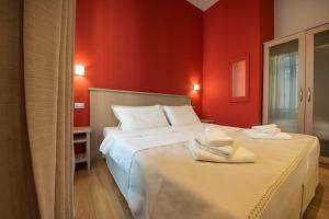 Posteľ alebo postele v izbe v ubytovaní Residenza Palazzo Negri
