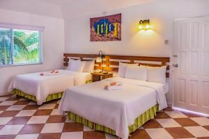 Lova arba lovos apgyvendinimo įstaigoje Royal Decameron Club Caribbean Resort - All Inclusive