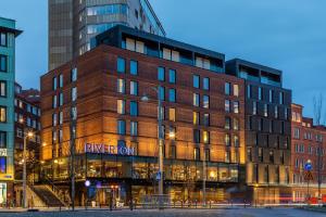 a brick building with a river north sign on it at Hotel Riverton in Gothenburg
