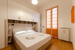 Posteľ alebo postele v izbe v ubytovaní JOIVY Apt for 4, metres from beach, in Sestri Levante