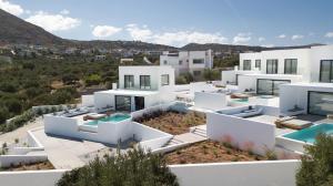 - une vue aérienne sur une maison blanche dans l'établissement Cocoon Luxury Villas, à Chersónissos