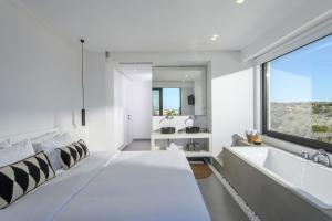 Postel nebo postele na pokoji v ubytování Cocoon Luxury Villas + 33 fotografií