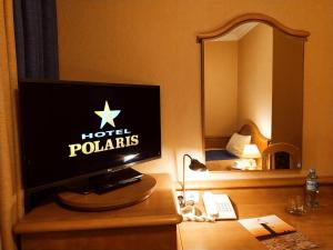 TV a/nebo společenská místnost v ubytování Hotel Polaris