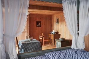 Postel nebo postele na pokoji v ubytování Nostalgie Bed & Breakfast Chrämerhus