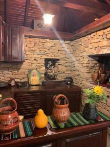 A kitchen or kitchenette at The Legends , Art & Forest