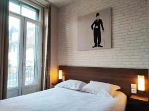 Atipik Hôtel客房内的一张或多张床位