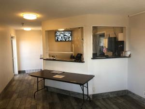 a dining room with a table in a room at Ameri-Stay Inn & Suites in Clearfield