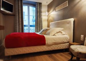 Atipik Hôtel客房内的一张或多张床位