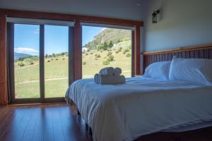 Kama o mga kama sa kuwarto sa Austral Patagonian Lodge