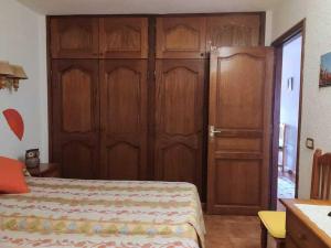 Łóżko lub łóżka w pokoju w obiekcie Apartamento Neptuno playa 06