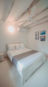 Katil atau katil-katil dalam bilik di Hotel Marbelo Coveñas