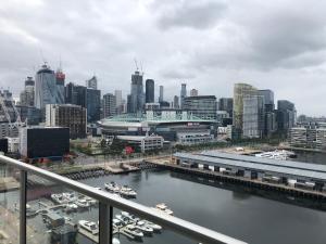 a large body of water with a bridge over it at Accent Accommodation@Docklands in Melbourne