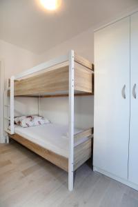 Poschodová posteľ alebo postele v izbe v ubytovaní Villa Stella