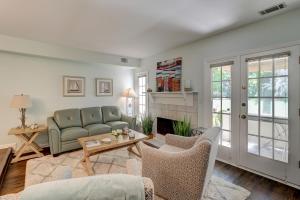a living room with a couch and a table at 110 Evian 2 BR Shipyard in Hilton Head Island
