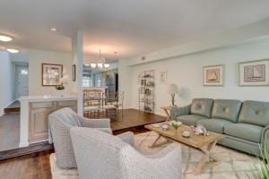 a living room with a couch and chairs and a table at 110 Evian 2 BR Shipyard in Hilton Head Island