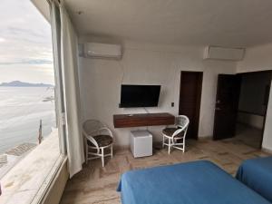 TV/trung tâm giải trí tại 62 ROOM PENINSULA CAPITAN