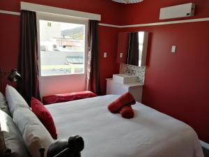 Ένα ή περισσότερα κρεβάτια σε δωμάτιο στο The Duke Hostel