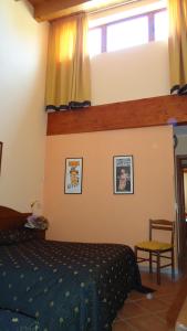 Letto o letti in una camera di Hotel Archimede Ortigia