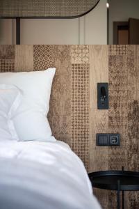 Postel nebo postele na pokoji v ubytování Apfelhotel Torgglerhof