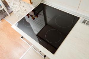 Kuchyň nebo kuchyňský kout v ubytování Vikend kuća Planinski raj