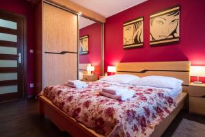 Posteľ alebo postele v izbe v ubytovaní Apartamenty Rodzinne II ApartZakop