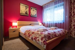Posteľ alebo postele v izbe v ubytovaní Apartamenty Rodzinne II ApartZakop