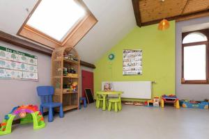 Krakkaklúbburinn á L'ancienne école d'Erpigny