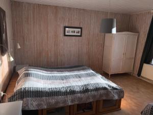 Postel nebo postele na pokoji v ubytování L'ancienne école d'Erpigny