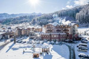 Tevini Dolomites Charming Hotel v zime