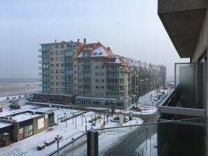 a view of a city in the snow with buildings at Mare Nostrum 0402 in Nieuwpoort