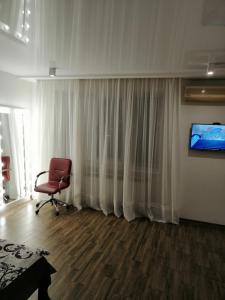 TV a/nebo společenská místnost v ubytování Studio Apartment Center