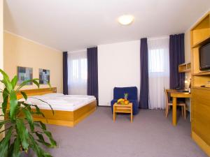 TV a/nebo společenská místnost v ubytování Hotel Trend