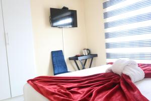 Säng eller sängar i ett rum på KwaZikode Bed & Breakfast
