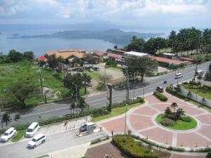 an aerial view of a street with cars on the road at Wind and Sea at Wind Residences in Tagaytay