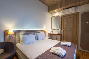 
Een bed of bedden in een kamer bij Puding Marina Residence
