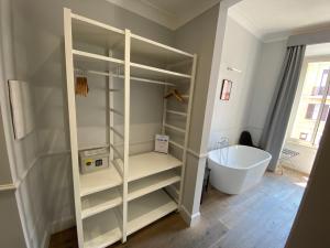 A bathroom at Holidays Suites Navona Még 37 kép