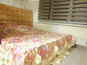 Кровать или кровати в номере Апартаменты в центре Балашихи