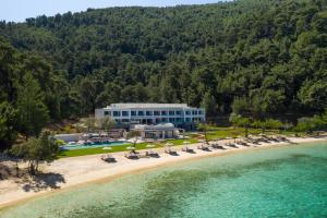 an aerial view of a resort on the beach at Vathi Cove Luxury Resort & Spa in Chrysi Ammoudia