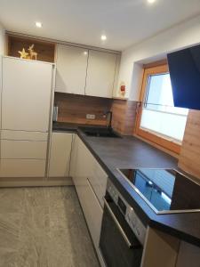 A kitchen or kitchenette at Haus Grünbacher